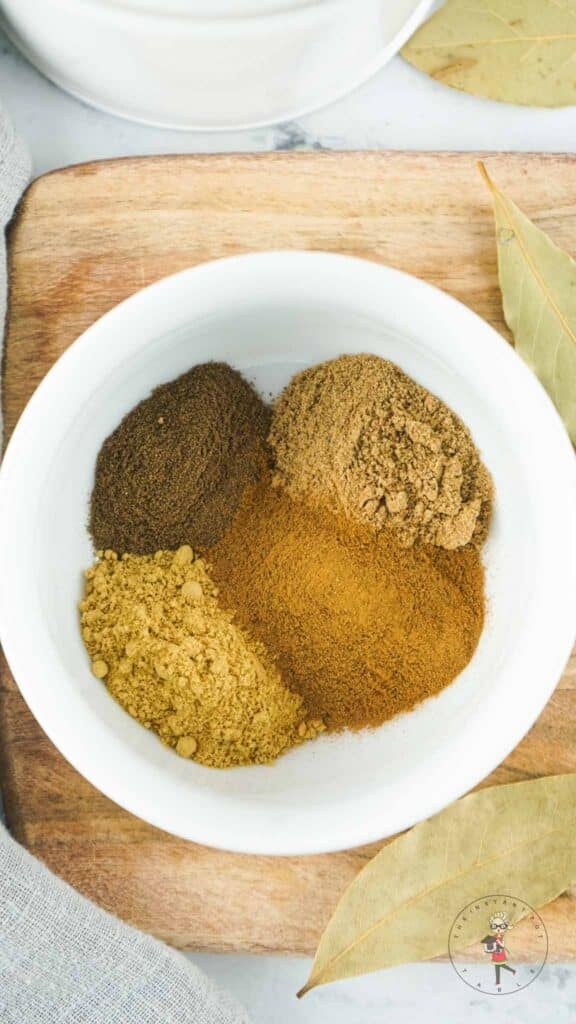 Four different spices in a bowl.