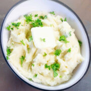 Mashed potatoes served in a bowl.
