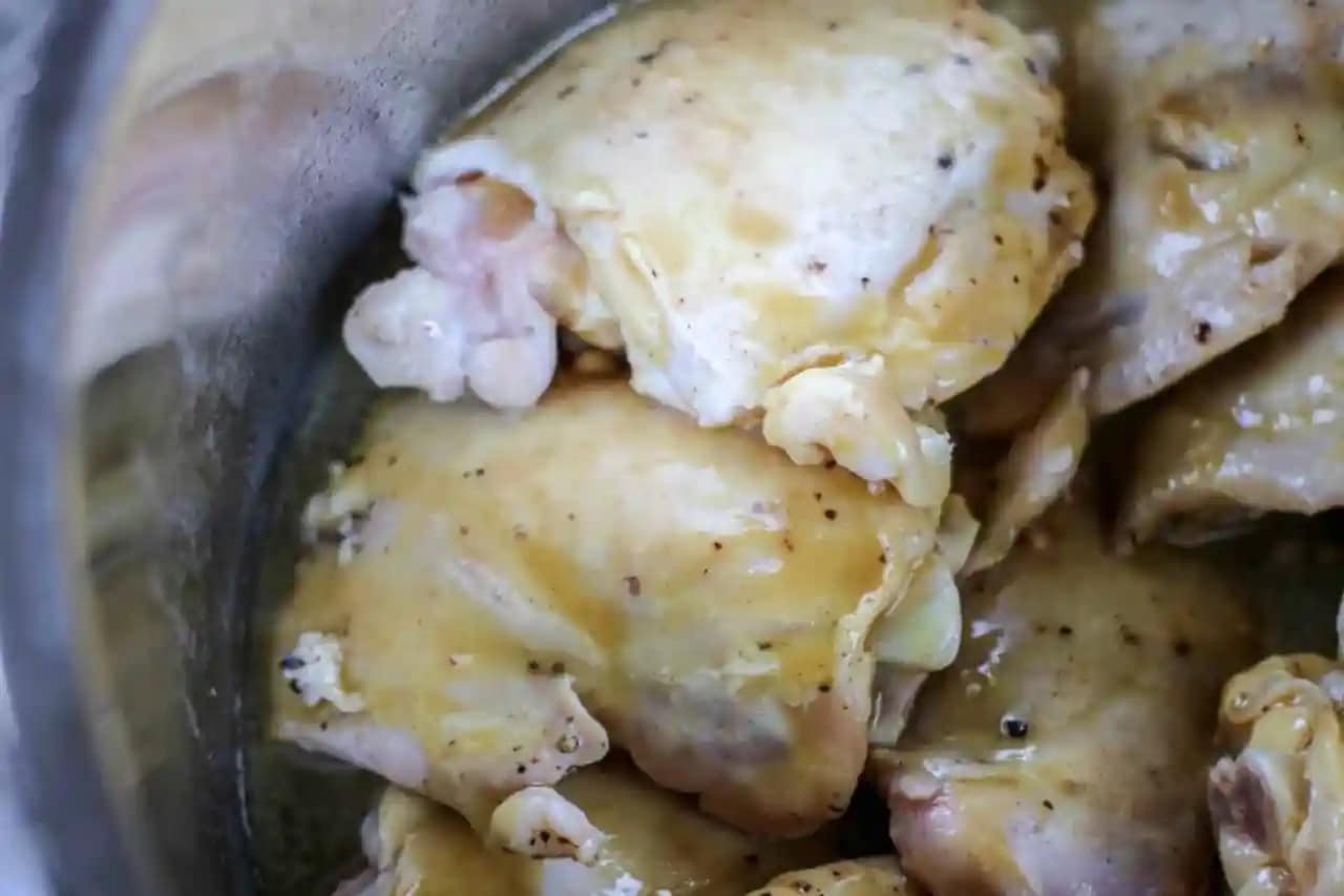 Searing chicken thighs.